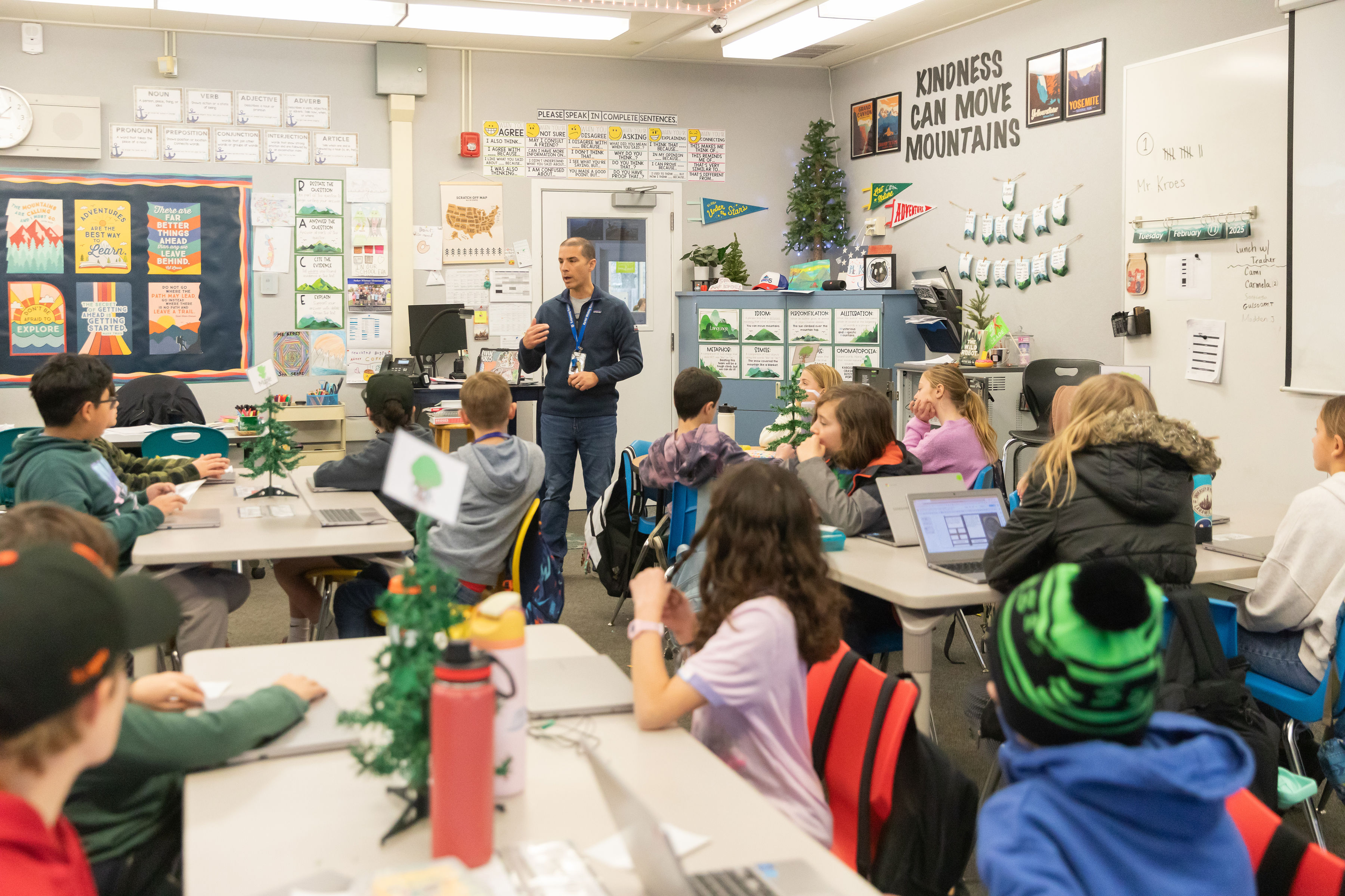 Parker Whitney students listening to their teacher.